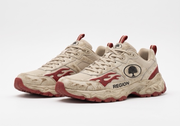 Region Sneaker — distressed cream runner with red flame panels